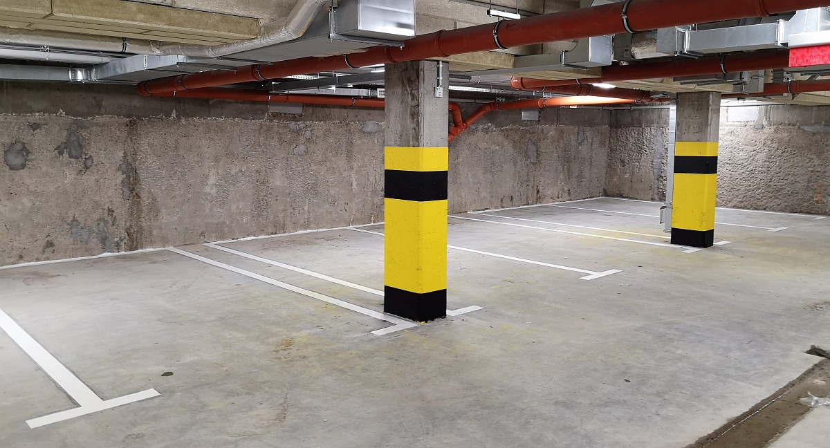 Oznakowanie parkingów i hal garażowych 11 | Malowanie oznaczeń oznakowań poziomych Poznań
